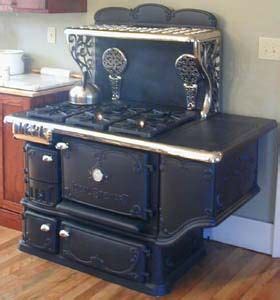 antique wood cook stove converted to gas